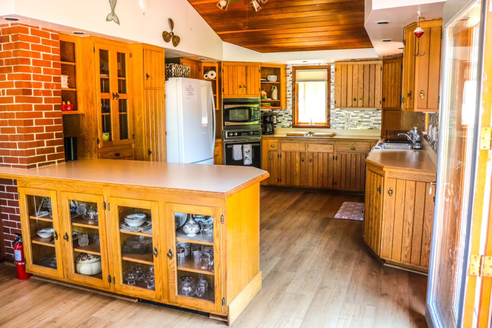 Full kitchen with island inside The Boathouse cottage