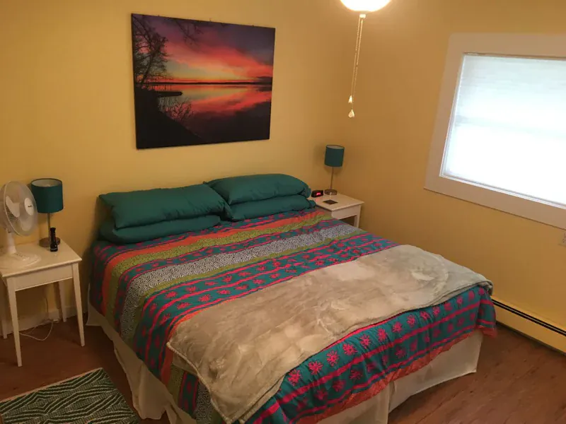 Bedroom inside the Riverview Cottage