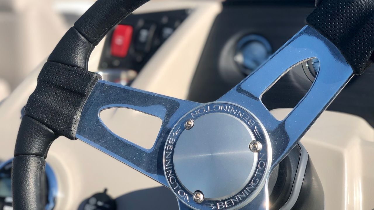 Tritoon with family enjoying Torch Lake